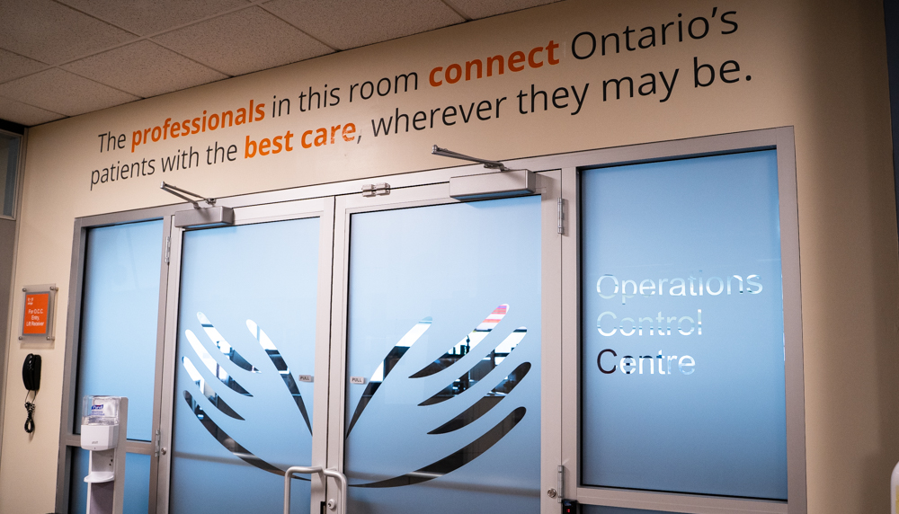 Exterior of the Operations Control Centre. A quote written above the doors says, 